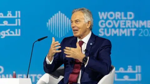 Labour defends net-zero policies after Blair criticism
