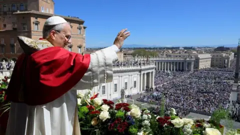 Pope Leo calls for global leaders to choose peace in his first Easter Mass