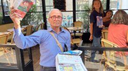 France&#039;s last newspaper hawker gets Order of Merit from his old customer - President Macron