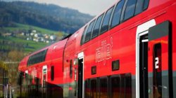 Man jumps on to moving high-speed train