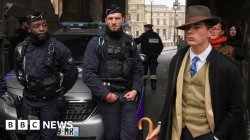 Mystery &#039;fedora man&#039; at Louvre heist scene revealed as teenage detective fan