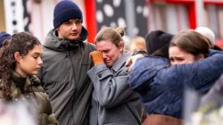 Swiss open criminal case against managers of ski resort bar after deadly fire