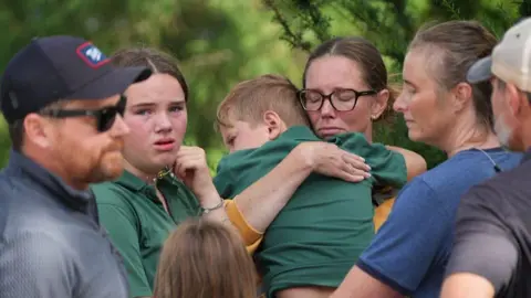 Minneapolis school attacker 'obsessed with idea of killing children', officials say