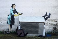 Waking up with a Banksy on your wall: The differing fortunes of two homeowners