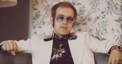 Elton John had no cash leaving fiancée to pay for everything and ‘went everywhere by bus’