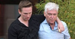 Phillip Schofield, 63, spotted with arms around 30-year-old male companion
