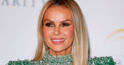Amanda Holden shows off toned legs as she kicks back during BBC filming