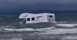 Campervan swept out to sea after getting stuck in sand on popular UK beach