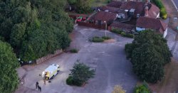 Man shot by cops as bomb squad swarms village pub