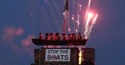 Boats bonfire LIVE: Migrant effigies spectacularly TORCHED as police refuse to intervene