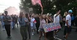 Migrant hotel protest LIVE: Protestors chant &#039;protect our kids&#039; as flares set off