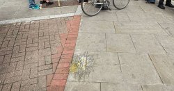 Moment pro-migrant protesters are pelted with eggs outside asylum hotel