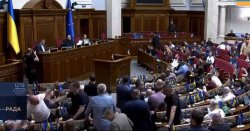 Insane moment punches thrown in parliament as MPs brawl after major Zelensky U-turn