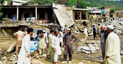 Flash floods in Pakistan leave 220 dead, sweep away homes and trap tourists