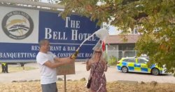 Moment Epping locals pop Champagne outside migrant hotel as it&#039;s forced to close