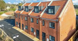 Fury as refugees handed £300k town houses with electric car charging while locals struggle