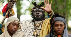 Moment &#039;African tribe&#039; living in Scottish woods arrested as immigration officers swoop in