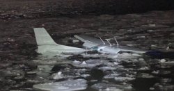 Horror as plane crashes into frozen Hudson River in New York just miles from airport