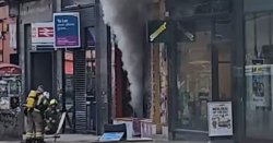 Emergency services rush to fire near major UK train station