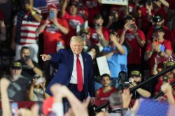 Trump holds huge rally to mark 100 days of tariffs, trade wars and deportations