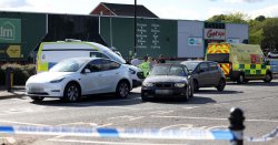 Woman dies after car rams into pedestrians as child also injured