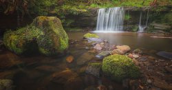 Stunning UK hidden beach with lush waterfalls only accessible by foot